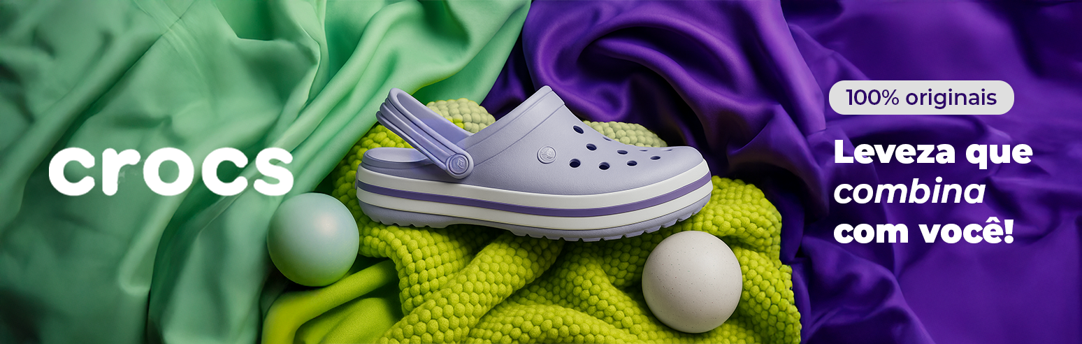Crocs lilás original em destaque sobre tecidos coloridos, conforto e estilo na Santa Apolônia